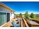 Outdoor living space with a spacious deck, perfect for relaxing and enjoying the view at 34942 Wagon Wheel Trl, Elizabeth, CO 80107