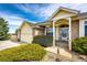 Charming single-Gathering home featuring a welcoming front porch and an attached two-car garage at 34942 Wagon Wheel Trl, Elizabeth, CO 80107