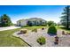 Attractive ranch-style home with an expansive lawn, mature trees, and rock garden at 34942 Wagon Wheel Trl, Elizabeth, CO 80107