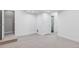 A finished basement area with neutral carpet and recessed lighting offers versatile living space at 11488 E 25Th Dr, Aurora, CO 80010
