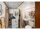 Basement bathroom with a shower/tub combo and stackable washer/dryer at 2640 S York St, Denver, CO 80210