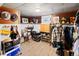 Basement closet with ample storage and clothing racks at 2640 S York St, Denver, CO 80210