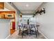 Elegant dining area featuring a mirrored wall, stylish table setting and decor at 9283 E Arbor Cir # C, Englewood, CO 80111