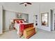 Main bedroom features high ceilings, neutral paint, and a cozy wooden bed at 2937 W Yarrow Cir, Superior, CO 80027