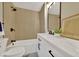Bathroom featuring modern vanity, stylish fixtures, tub, and neutral decor at 1980 S Kearney Way, Denver, CO 80224