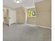 A minimal bedroom with neutral colors, large window, and a large open floor plan at 1980 S Kearney Way, Denver, CO 80224