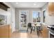 Bright breakfast nook area, with a view to the backyard, in the kitchen at 1295 Elm St, Denver, CO 80220