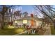 Charming single-story home with a brick chimney and manicured lawn, hosting an Open House on Saturday, June 14th from 3-5 PM at 1295 Elm St, Denver, CO 80220