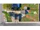 Aerial view of the property showcasing the layout, landscaping, and surrounding neighborhood at 391 N 7Th Ave, Brighton, CO 80601