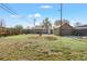 Spacious backyard with a detached garage, offering plenty of room for recreation and outdoor activities at 391 N 7Th Ave, Brighton, CO 80601