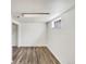 Finished basement features wood floors, white walls, window and closet at 3118 S Joplin Ct, Aurora, CO 80013
