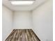 Finished basement space offering wood-style flooring and bright lighting at 3118 S Joplin Ct, Aurora, CO 80013