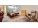 Finished basement area offering additional living space with a cozy sleeping area at 2023 S Rifle St, Aurora, CO 80013