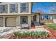 Charming two-story home with brick accents, landscaping, and a welcoming front entrance at 2023 S Rifle St, Aurora, CO 80013