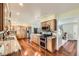 Modern kitchen with stainless steel appliances, granite countertops, and wooden cabinets at 2023 S Rifle St, Aurora, CO 80013