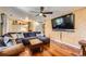 Comfortable living room with wood paneling and modern furnishings at 2023 S Rifle St, Aurora, CO 80013