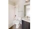 Bathroom features a shower over tub, sleek vanity, and modern fixtures at 11491 Alla Breve Cir, Lone Tree, CO 80134