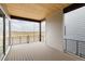 Large covered patio with wood ceiling offers great outdoor living space and expansive neighborhood views at 11491 Alla Breve Cir, Lone Tree, CO 80134