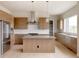 Bright kitchen featuring stainless steel appliances, an island, and sleek cabinets at 11491 Alla Breve Cir, Lone Tree, CO 80134