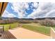 Deck with a view of the surrounding landscape and mountains at 3840 Sierra Vista Rd, Monument, CO 80132