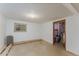 Unfinished basement provides ample space for storage or customization with a small window at 3840 Sierra Vista Rd, Monument, CO 80132