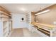 Well-organized garage with ample shelving and a workbench, perfect for projects and storage at 3840 Sierra Vista Rd, Monument, CO 80132