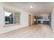 Open-concept kitchen featuring grey cabinets, modern appliances, and lots of natural light at 3840 Sierra Vista Rd, Monument, CO 80132
