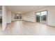 Bright living space with wood-look floors and abundant natural light at 3840 Sierra Vista Rd, Monument, CO 80132