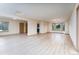 Bright living space with wood-look floors and abundant natural light at 3840 Sierra Vista Rd, Monument, CO 80132