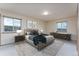 This bedroom has a large bed, great windows, and natural light at 3840 Sierra Vista Rd, Monument, CO 80132
