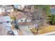 Aerial view of home with a well-maintained yard, mature trees, and surrounding neighborhood at 3930 S Argonne Way, Aurora, CO 80013