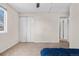 Bedroom with neutral walls, carpet flooring, closet, and window at 3930 S Argonne Way, Aurora, CO 80013