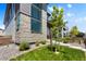 Modern exterior showcases stone accents and manicured landscaping at 21405 E 59Th Dr, Aurora, CO 80019