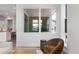 Bright living room boasts large windows and modern decor at 21405 E 59Th Dr, Aurora, CO 80019