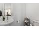 Modern powder room with a stylish sink and minimalist decor at 21405 E 59Th Dr, Aurora, CO 80019