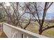 Scenic balcony view overlooking a golf course and distant mountains at 9815 Raleigh St, Westminster, CO 80031