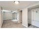 Finished basement features neutral carpet, paint, and closet at 3075 Fairfax St, Denver, CO 80207