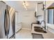 Modern kitchen features stainless steel appliances, sleek countertops, and white cabinetry at 3075 Fairfax St, Denver, CO 80207