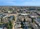 Straight-down aerial shot highlighting neighborhood streets, homes, and nearby commercial spaces at 3225 S Lincoln St, Englewood, CO 80113