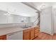 Bright kitchen featuring a breakfast bar, ample counter space, and modern appliances at 8237 W 54Th Ave # 2, Arvada, CO 80002