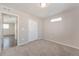 Bedroom featuring carpet flooring, closet, and neutral color walls at 17717 E 54Th Ave, Denver, CO 80249