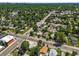 An expansive aerial view of tree-filled neighborhood and tree-lined streets at 3306 S Logan St, Englewood, CO 80113
