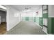 The finished basement offers versatile space with paneled walls and unique shelving at 3306 S Logan St, Englewood, CO 80113