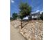 A charming exterior view of a home with stone landscaping at 3306 S Logan St, Englewood, CO 80113