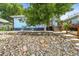 This lovely home boasts mature trees and a well-manicured yard, creating great curb appeal at 3306 S Logan St, Englewood, CO 80113