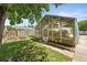 Backyard greenhouse with clear panels and a small adjacent garden area at 3306 S Logan St, Englewood, CO 80113