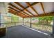Enclosed porch with lattice railing and view of the backyard at 3306 S Logan St, Englewood, CO 80113