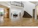 Bright foyer with hardwood floors and a sweeping staircase at 1328 E Layton Ave, Cherry Hills Village, CO 80113