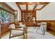 This beautiful wood paneled office space is brightly lit by a decorative chandelier at 1328 E Layton Ave, Cherry Hills Village, CO 80113