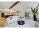 Spacious living area seamlessly connects to a modern kitchen at 1328 E Layton Ave, Cherry Hills Village, CO 80113
